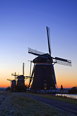 Image showing Three windmills