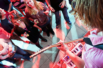 Image showing Guitarists hands