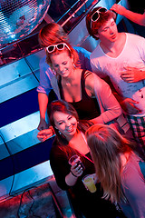 Image showing Party in a nightclub viewed from the DJ booth