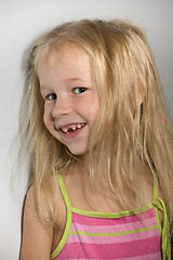 Image showing little girl without one front tooth