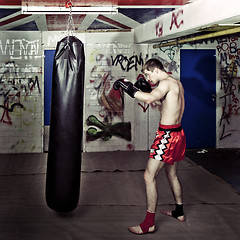 Image showing Punching boxer