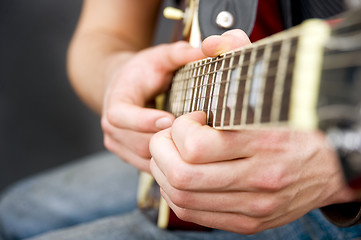 Image showing Guitar hands