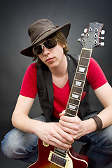 Image showing Young guitar player