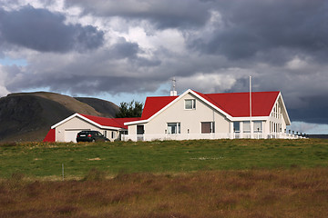 Image showing Red roofed house