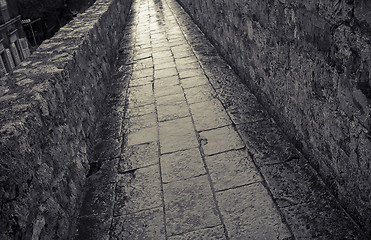 Image showing Town wall in rain