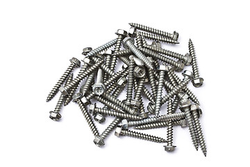 Image showing Heap of screws isolated on white 