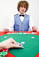 Image showing Peeking at cards