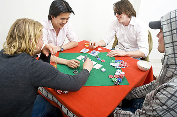 Image showing A friendly game of backroom poker