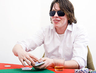 Image showing Cunning poker face