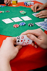 Image showing Peeking at the cards