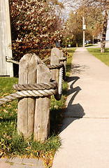 Image showing Fencepost with big rope.