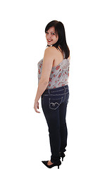 Image showing Standing girl in jeans.