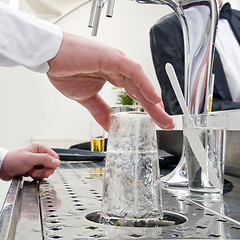 Image showing rinsing a glass