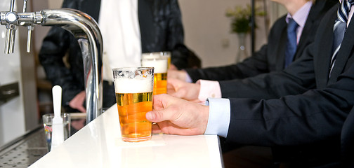 Image showing Beers on a Bar