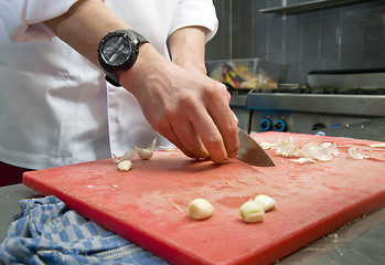 Image showing Cutting Garlic