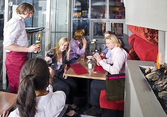Image showing Waiting tables