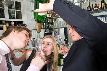 Image showing taking the last drop of champagne