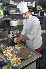 Image showing Preparing salad