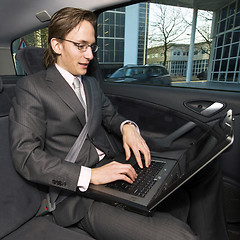 Image showing Working in a taxi