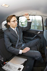 Image showing Businessman in a taxi