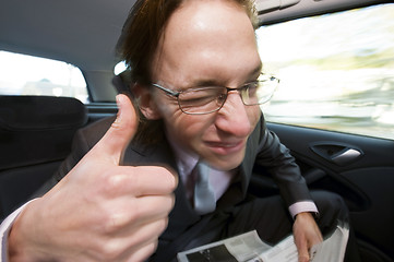 Image showing Happy backseat passenger