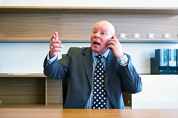 Image showing Intense phone call