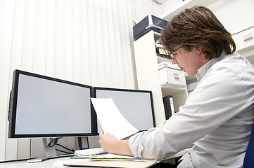 Image showing Studying a document