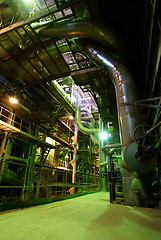 Image showing Equipment, cables and piping as found inside of a modern industr