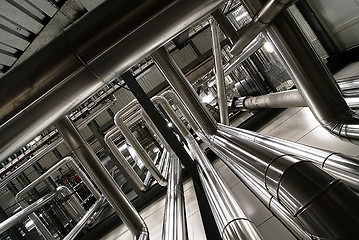 Image showing different size and shaped pipes and valves at a power plant