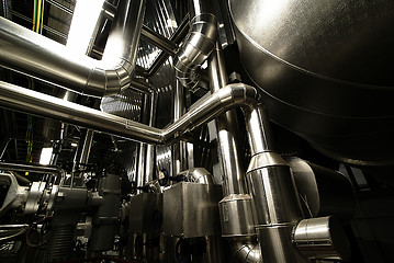 Image showing different size and shaped pipes and valves at a power plant