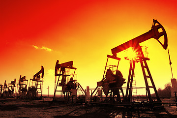 Image showing working oil pumps silhouette in row