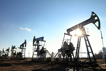 Image showing working oil pumps silhouette in row