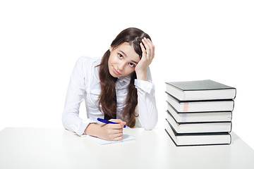 Image showing Sad girl with books