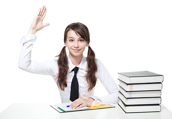 Image showing School girl rise a hand