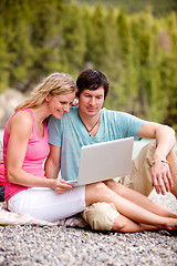 Image showing Outdoor Computer Couple