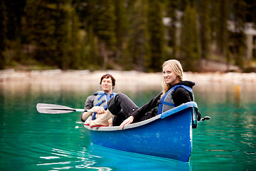 Image showing Couple Relaxing in a Canoe