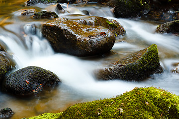 Image showing Falls on the small mountain river in a wood shooted in autumn