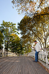 Image showing Cell Phone Man Park