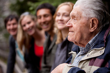 Image showing Elderly Man Telling Stories
