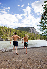 Image showing Man Woman Run Towards Water