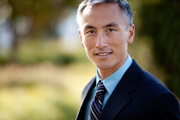 Image showing Middle Aged Businessman in Suit and Tie