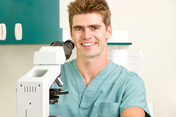 Image showing Doctor with Microscope 