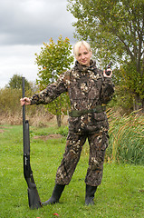 Image showing Female with gun.