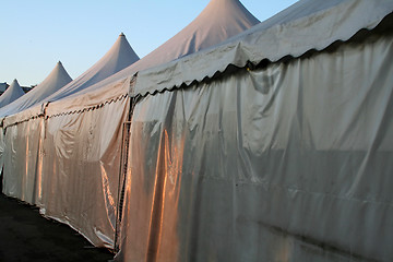 Image showing Tents lined up in a row