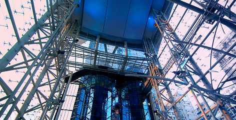 Image showing multi-story glass atrium at dusk 