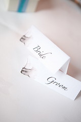 Image showing bride and groom place settings