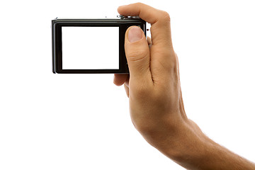 Image showing Photo camera in hand isolated on white