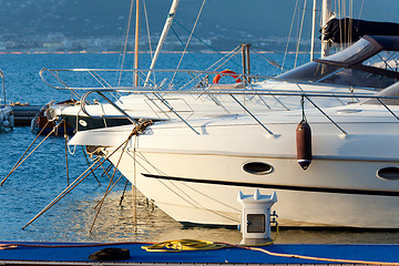 Image showing Luxury yachts anchored in small gulf