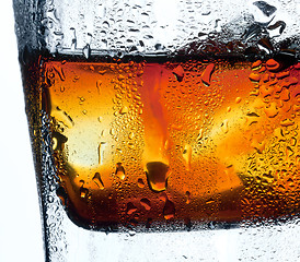 Image showing Closeup misted glass of whiskey