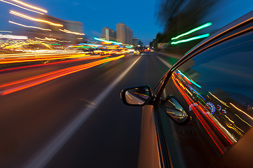 Image showing Car driving fast in the night city